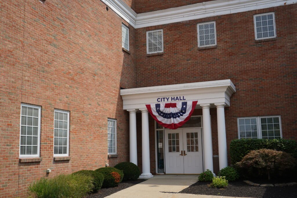 The City Hall entrance at Mayfield Heights, with CITY HALL lettered above the door