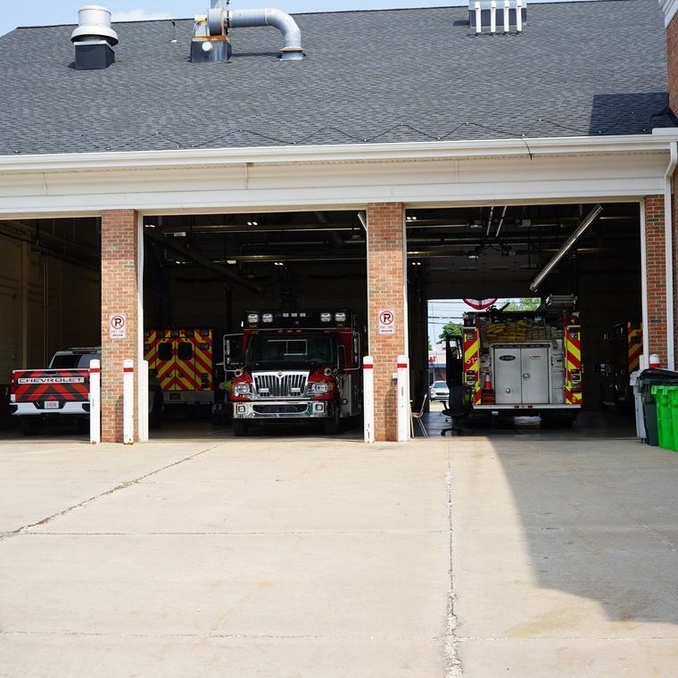 Mayfield Heights fire station with the engine bays open and trucks inside